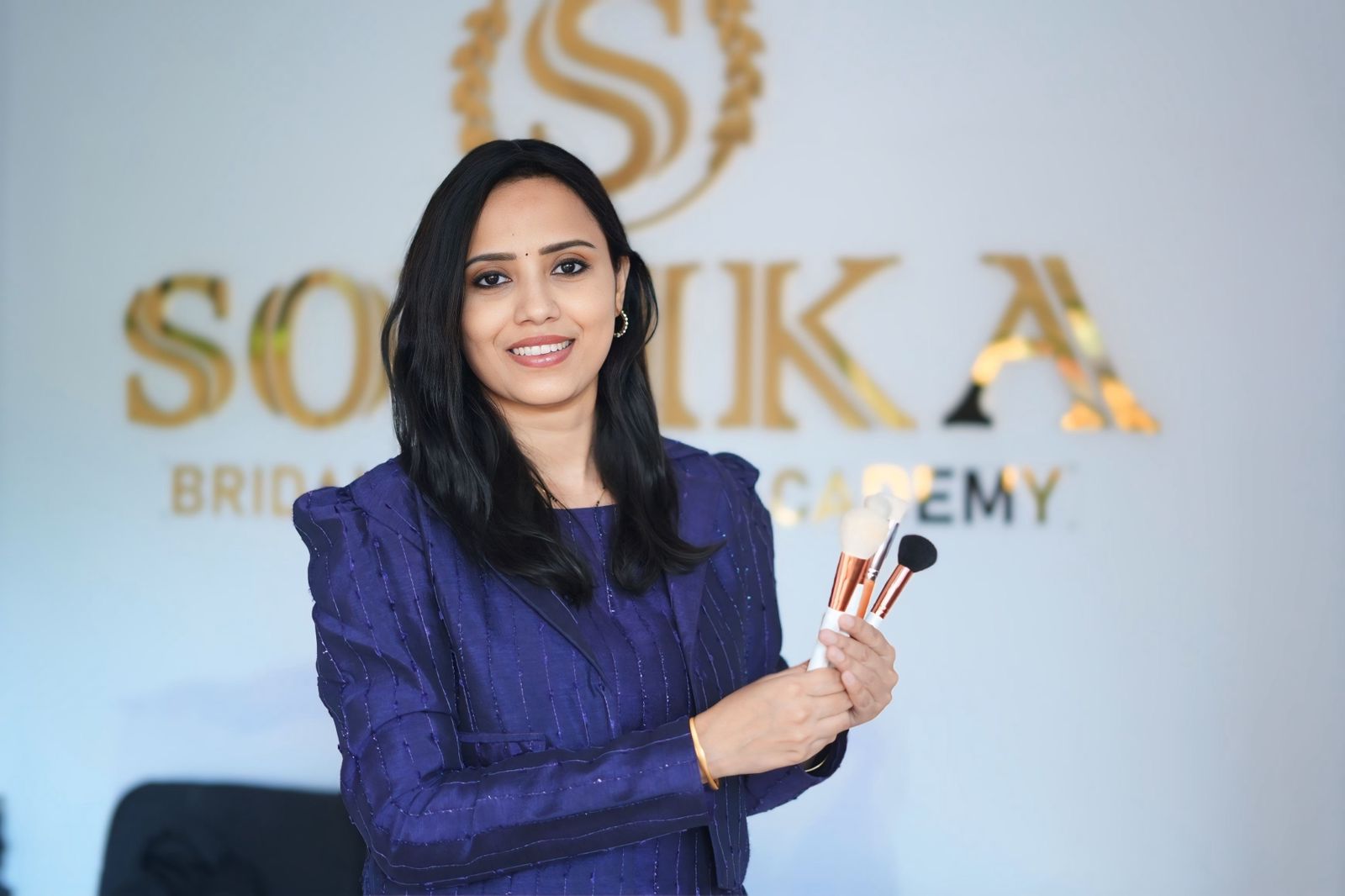 Bridal makeup session at a professional makeup studio in Hyderabad